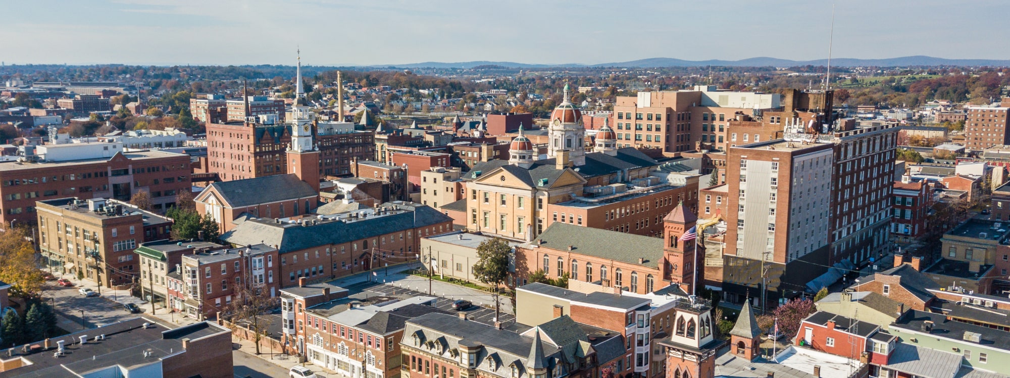 We Buy Houses Fast York, PA banner of aerial of York, PA for PA Home Solutions