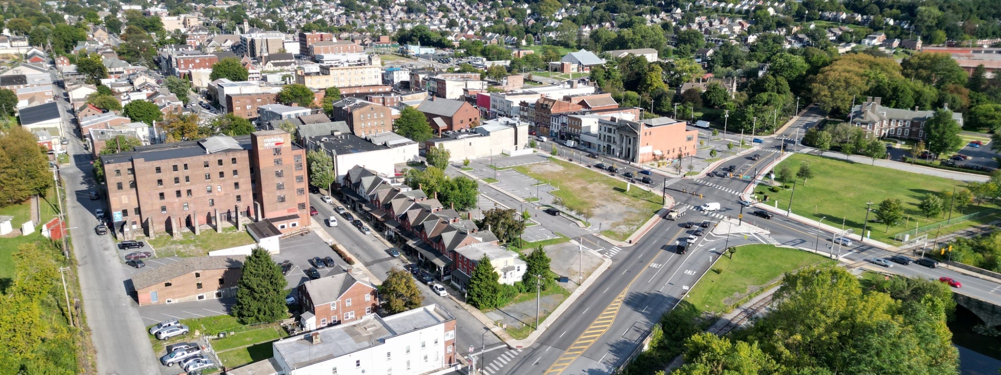 We Buy Houses Fast Coatesville, PA banner of downtown Coatesville for PA Home Solutions